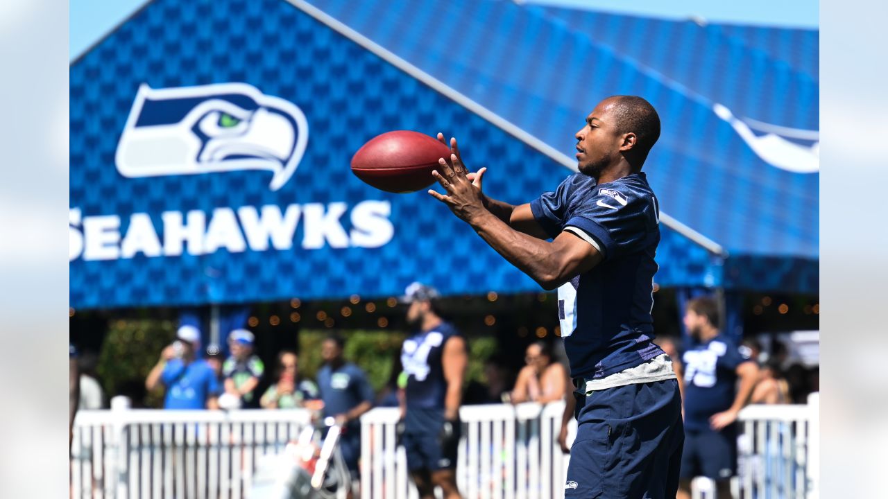 Seattle Seahawks tackle Abraham Lucas (72) walks on the field