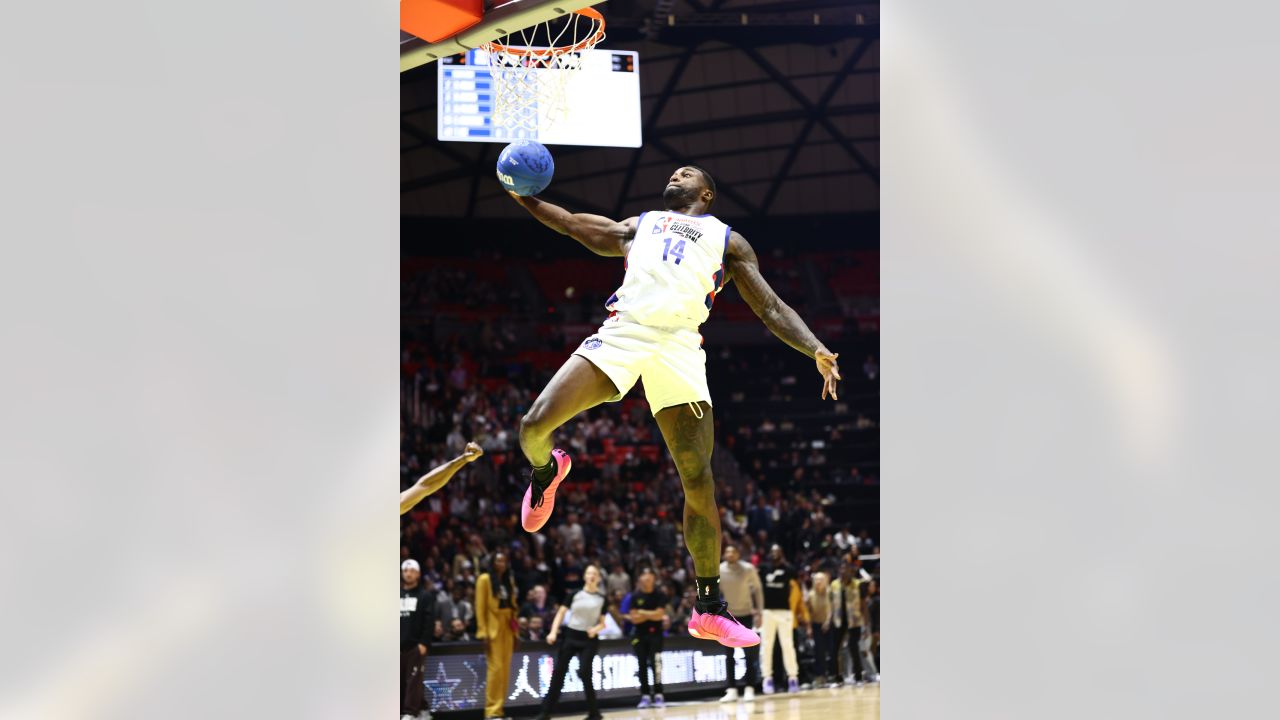 NFL football player DK Metcalf raises the MVP trophy from the NBA All-Star  Celebrity Game, Friday, Feb. 17, 2023, in Salt Lake City. (AP Photo/Rob  Gray Stock Photo - Alamy