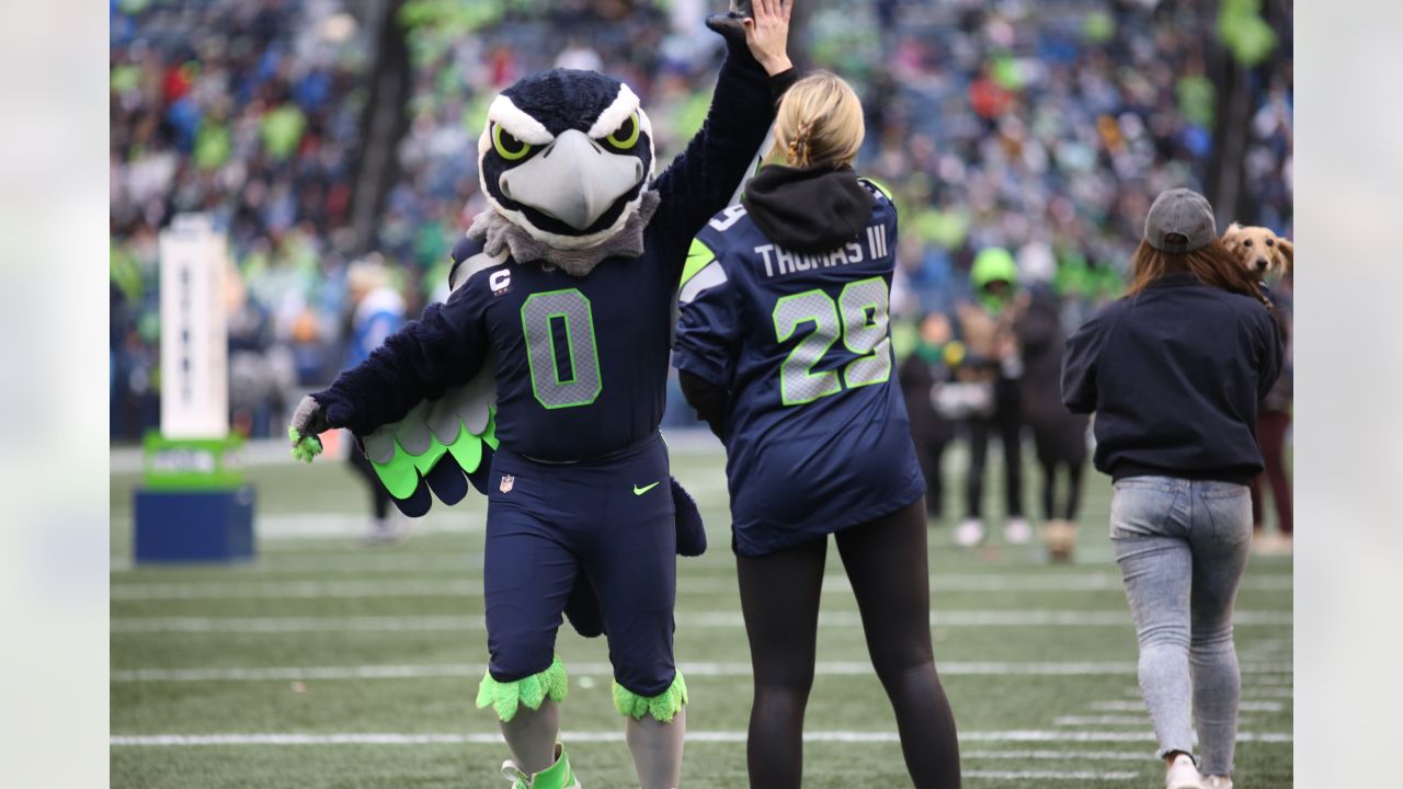 Seattle Seahawks defensive end Shelby Harris (93) runs onto the field  before an NFL football game against the New York Giants, Sunday, Oct. 30,  2022, in Seattle, WA. The Seahawks defeated the