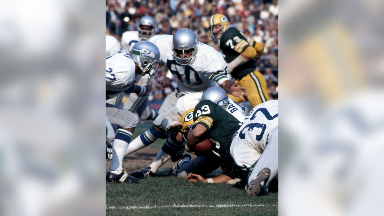 FILE - In this Dec 19. 2020, file photo, Green Bay Packers quarterback Aaron  Rodgers (12) smiles before an NFL football game against the Carolina  Panthers in Green Bay, Wis. After a