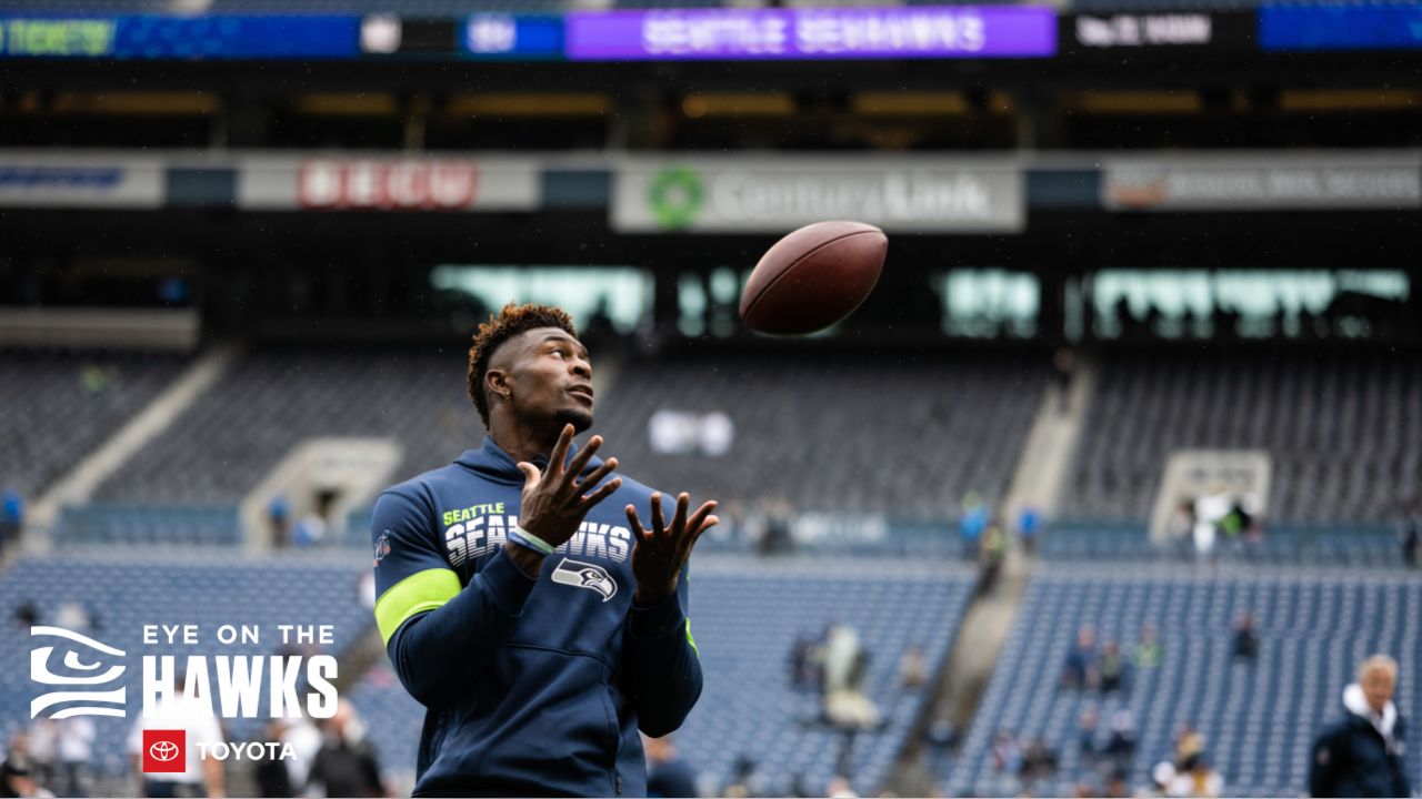 DK Metcalf of the Seattle Seahawks stretches during pregame warmups News  Photo - Getty Images