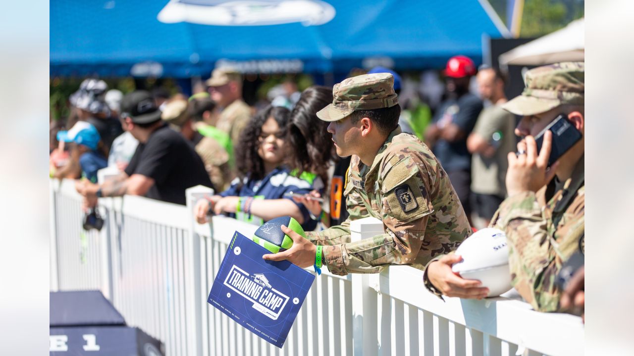 Seattle Seahawks - Lock taking time to meet with our military at practice  yesterday. Salute to service moment presented by USAA #SaluteToService