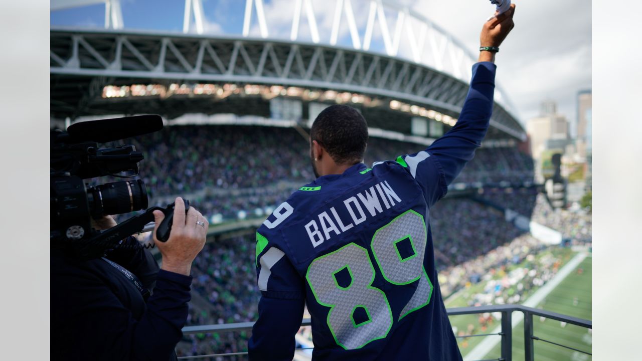 PHOTOS: Doug Baldwin Jr. Raises The 12 Flag