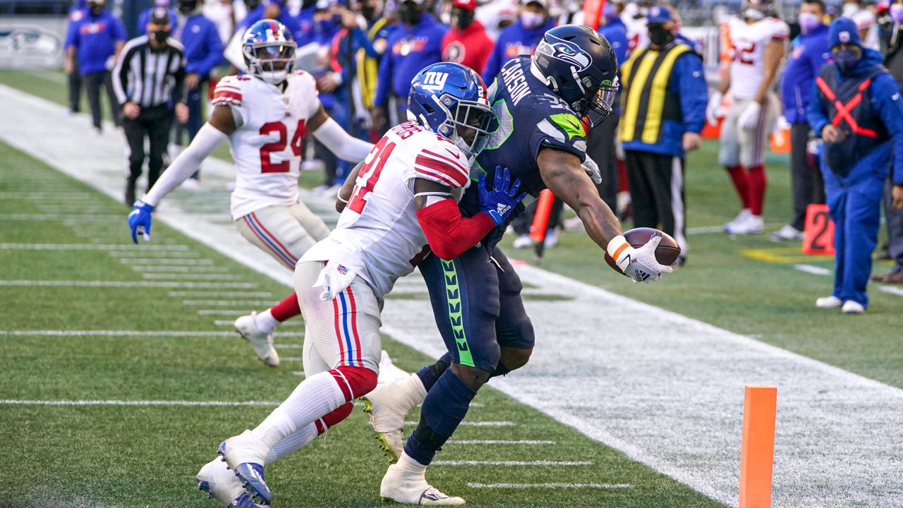 Seattle Seahawks' running back Chris Carson takes part in an NFL training  session at the Grove Hotel in Chandler's Cross, Watford, England, Thursday,  Oct. 11, 2018. The Seattle Seahawks are preparing for