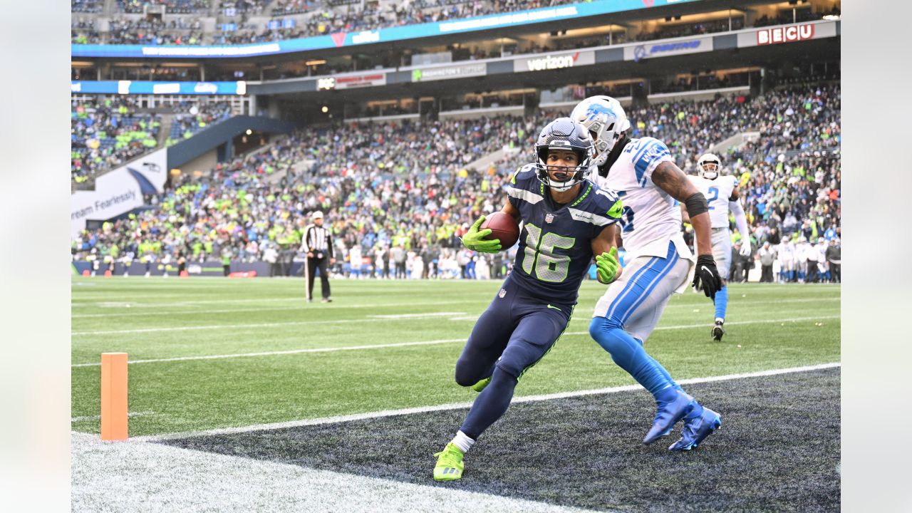 Seattle Seahawks quarterback Russell Wilson (3) greets wide receiver DK  Metcalf (14) during warmups before an NFL football game against the Tennessee  Titans, Sunday, Sept. 19, 2021, in Seattle. (AP Photo/John Froschauer