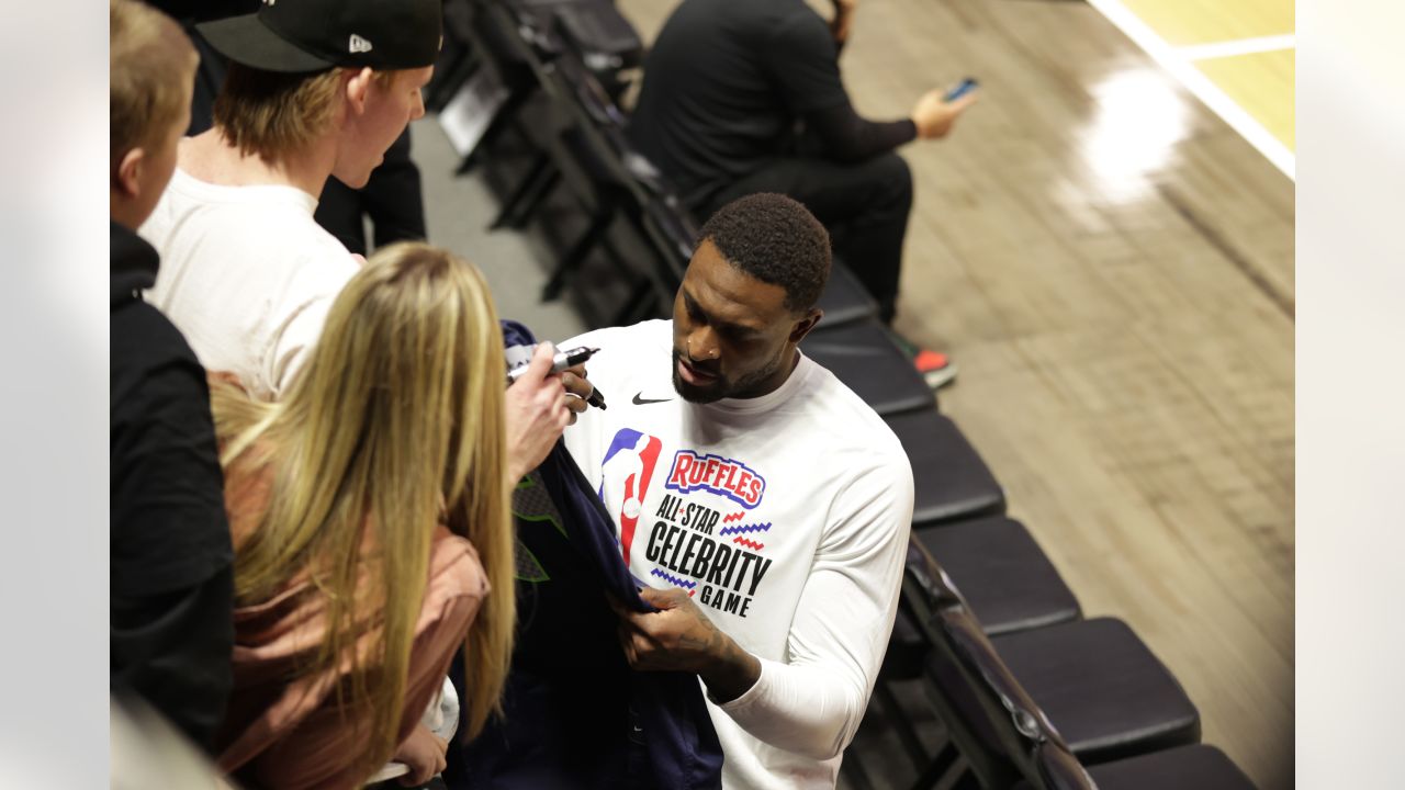 NFL football player DK Metcalf raises the MVP trophy from the NBA All-Star  Celebrity Game, Friday, Feb. 17, 2023, in Salt Lake City. (AP Photo/Rob  Gray Stock Photo - Alamy