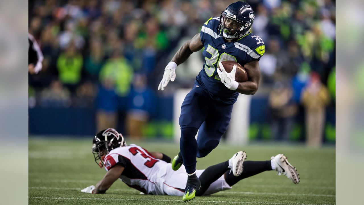 Seattle Seahawks running back (27) Mike Davis heads for the field