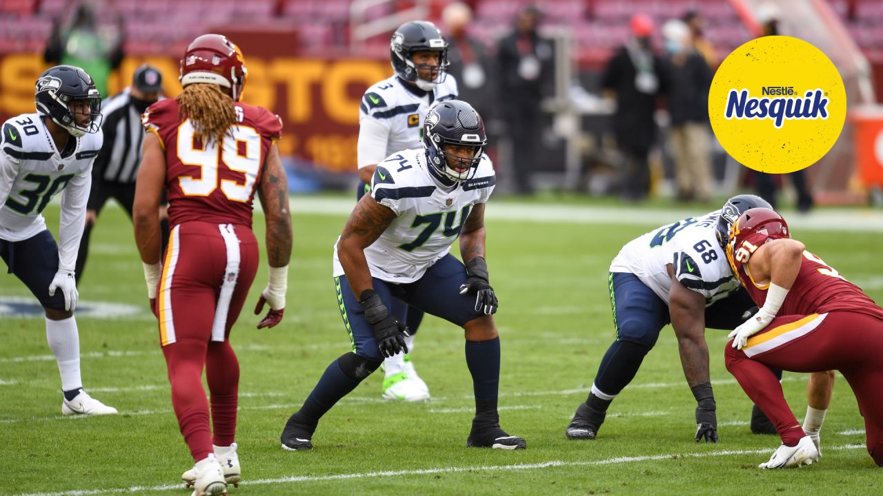 12s celebrate playoff-bound Seahawks after winning at Lumen Field Sunday