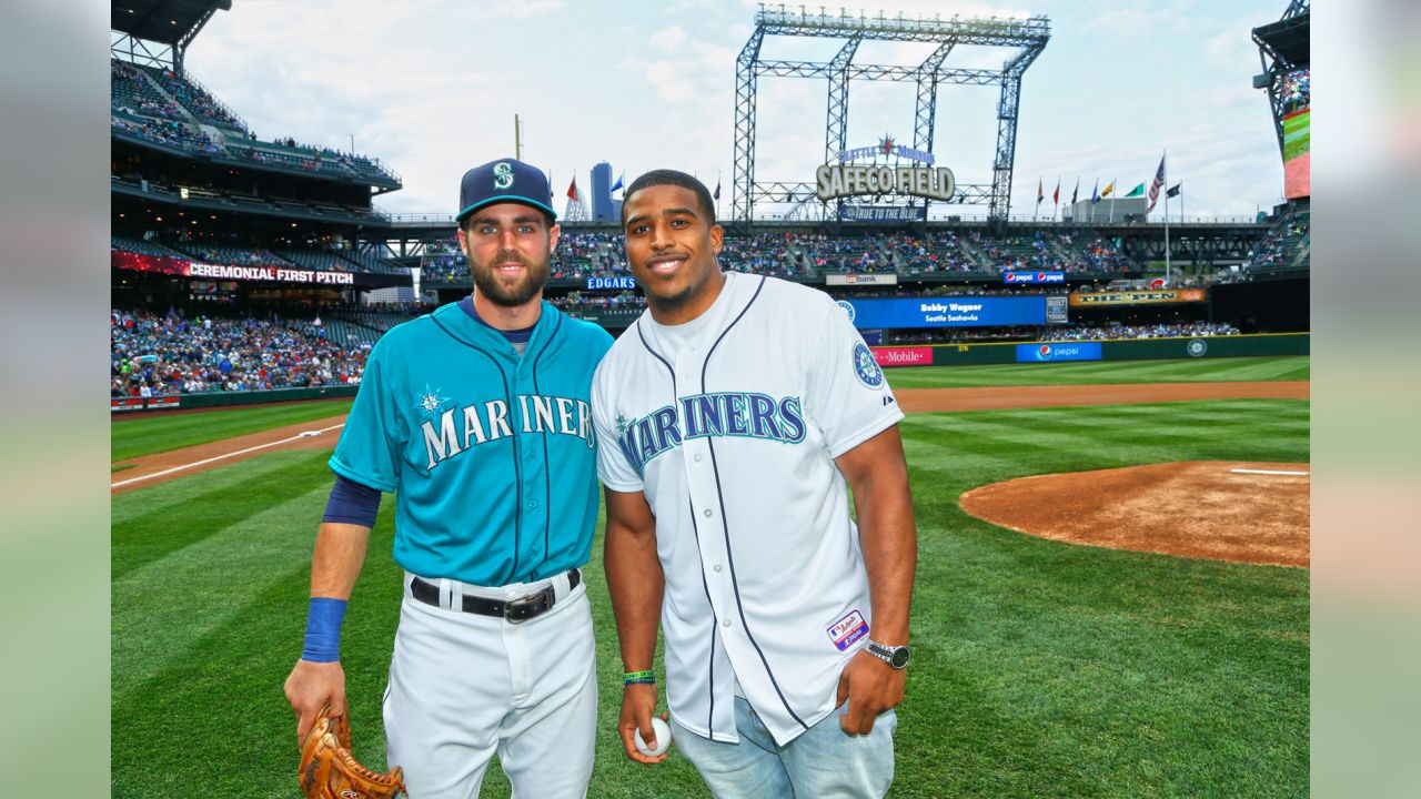 PHOTOS: Bobby Wagner Throws Out Ceremonial First Pitch At Mariners