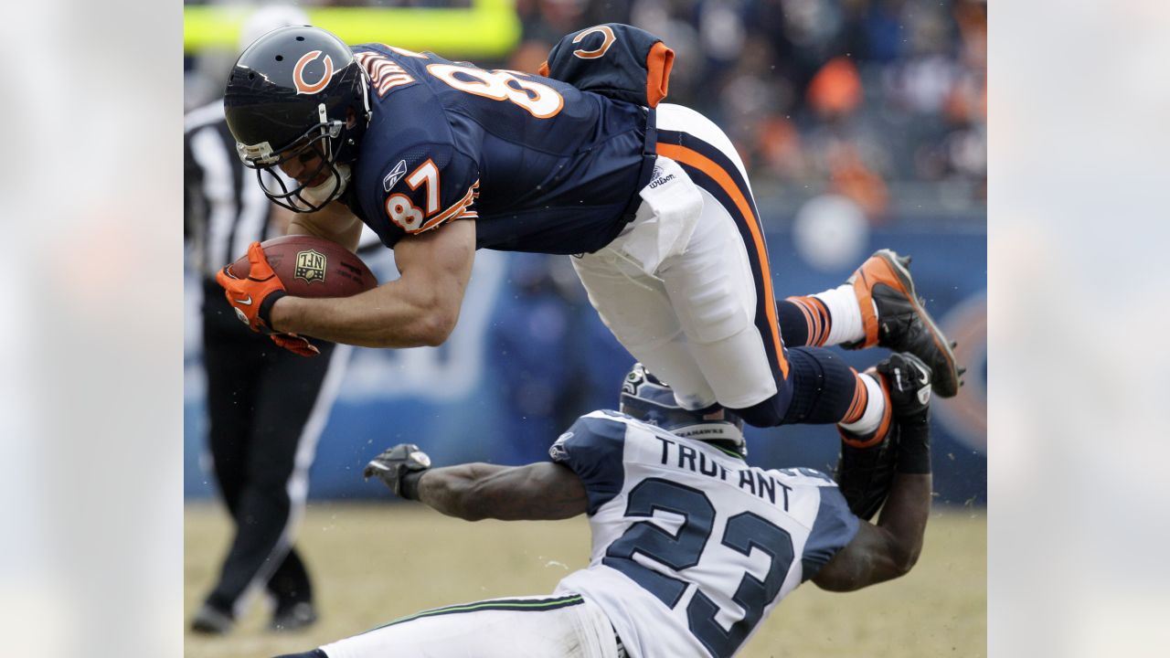 Former Seahawks player Marcus Trufant skydives into training camp