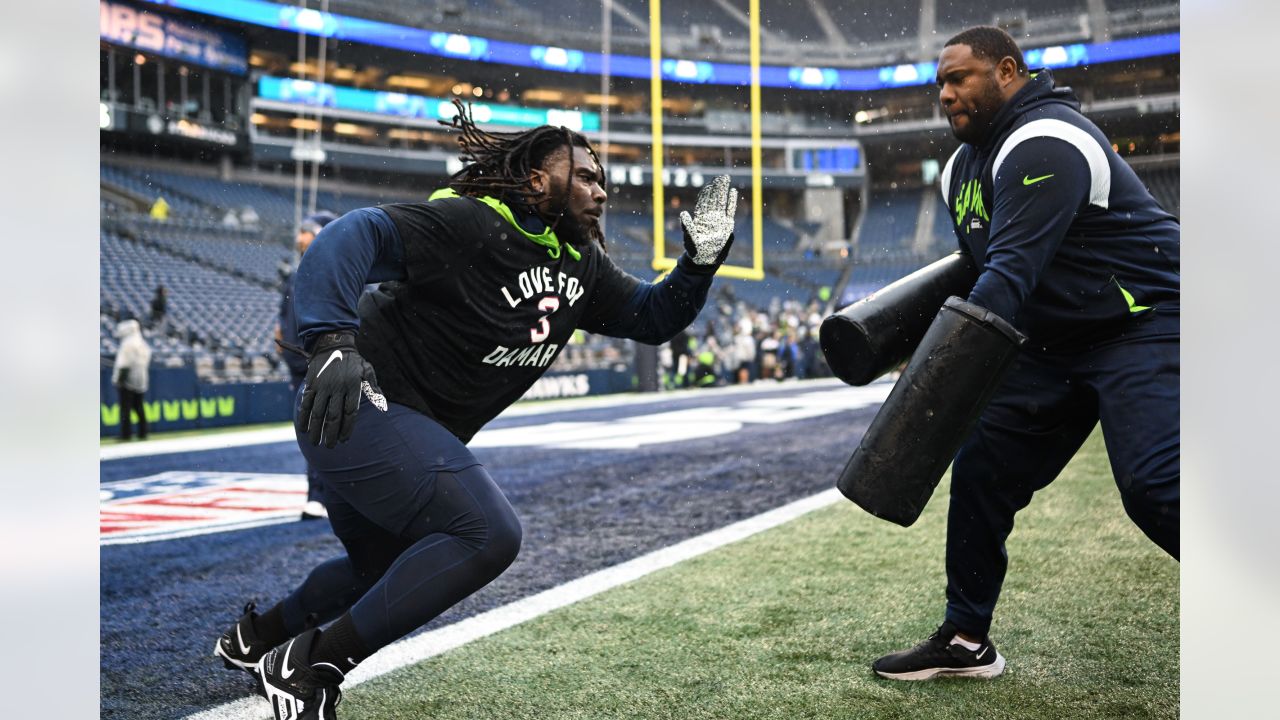 Look: Rams show love for Damar Hamlin with pregame shirts, custom cleats