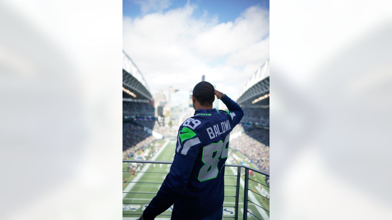 PHOTOS: Doug Baldwin Jr. Raises The 12 Flag