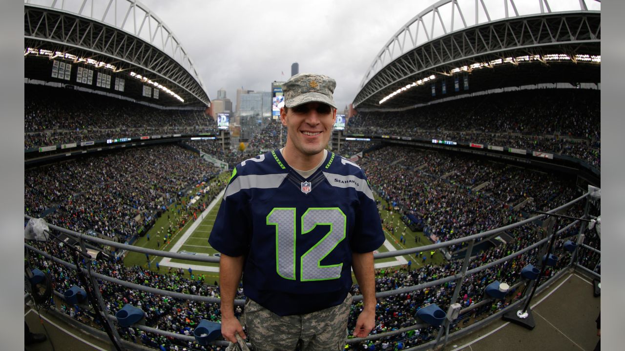 PHOTOS: Seattle Mariners Catcher Cal Raleigh Raises The 12 Flag