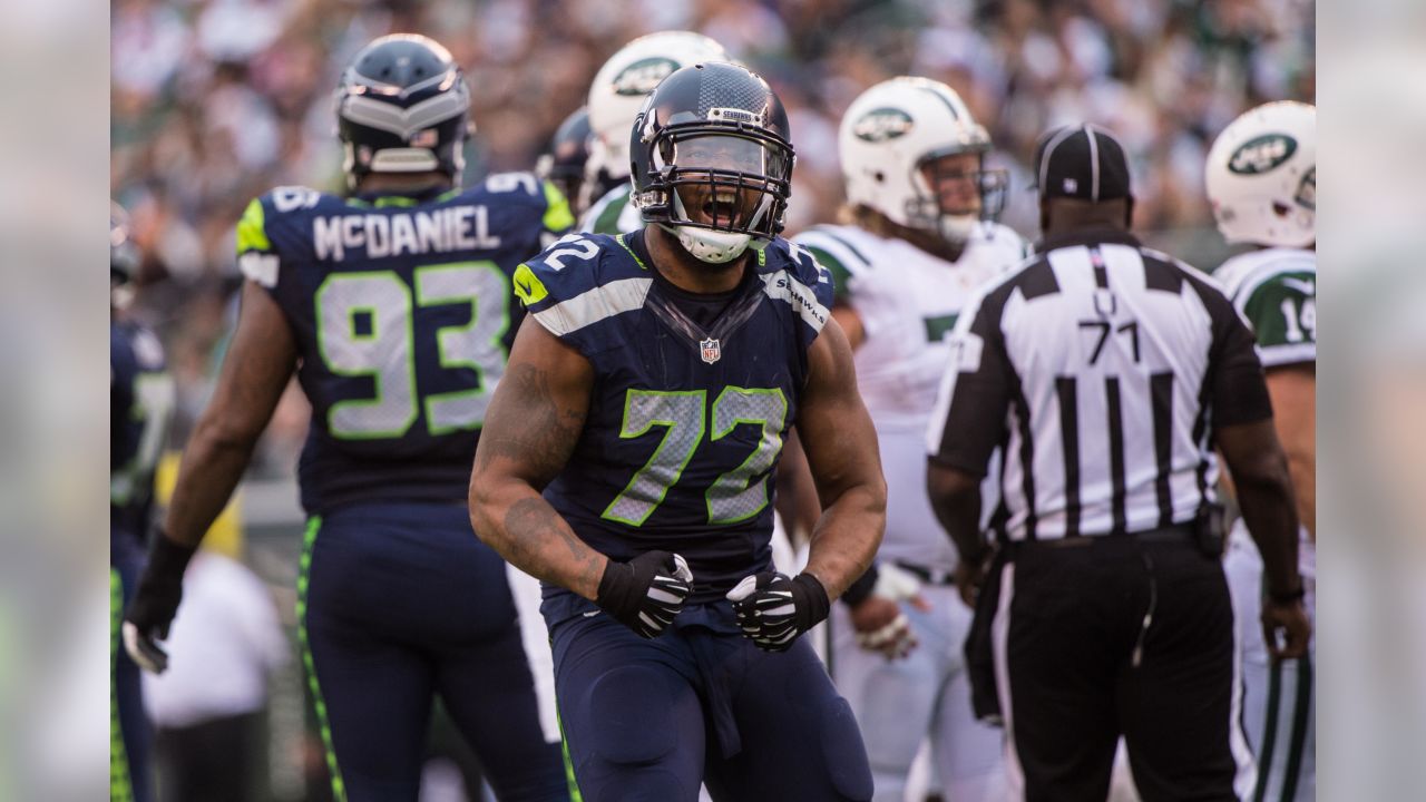 Seattle Seahawks outside linebacker Mike Morgan (57) wraps up