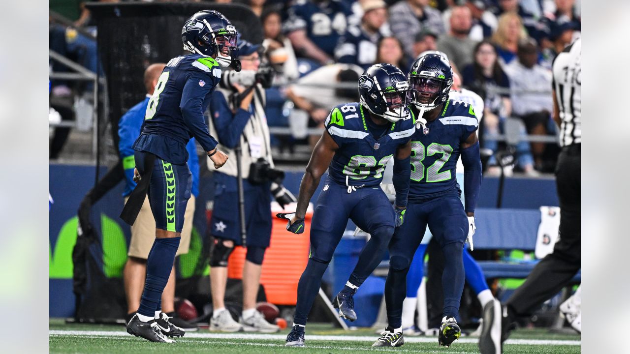 Seattle Seahawks running back DeeJay Dallas celebrates after scoring  against the Dallas Cowboys during the first half of a preseason NFL  football game Saturday, Aug. 19, 2023, in Seattle. (AP Photo/Lindsey Wasson