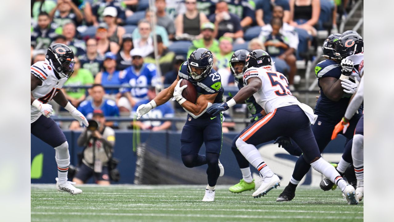 Seattle Seahawks quarterback Jacob Eason (17) scrambles before throwing a  pass in the second half of a preseason NFL football game against the Dallas  Cowboys in Arlington, Texas, Friday, Aug. 26, 2022. (