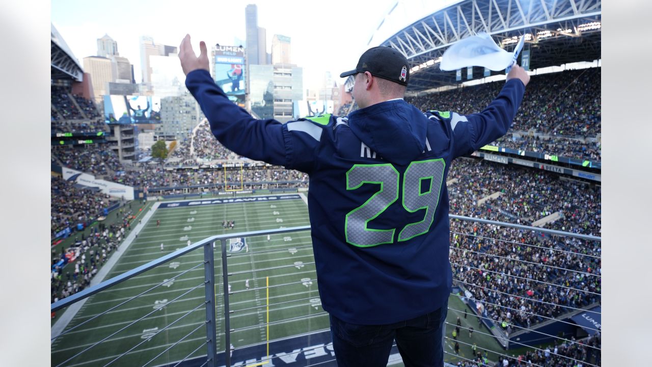 PHOTOS: Seattle Mariners Catcher Cal Raleigh Raises The 12 Flag