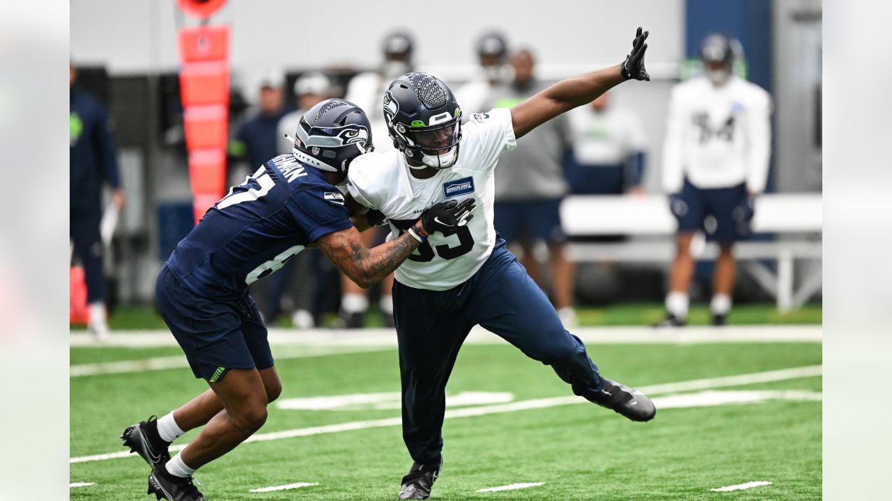 Seattle Seahawks linebacker Boye Mafe (53) walks with linebacker Derick  Hall (58) during the NFL football team's training camp, Thursday, July 27,  2023, in Renton, Wash. (AP Photo/Lindsey Wasson Stock Photo - Alamy