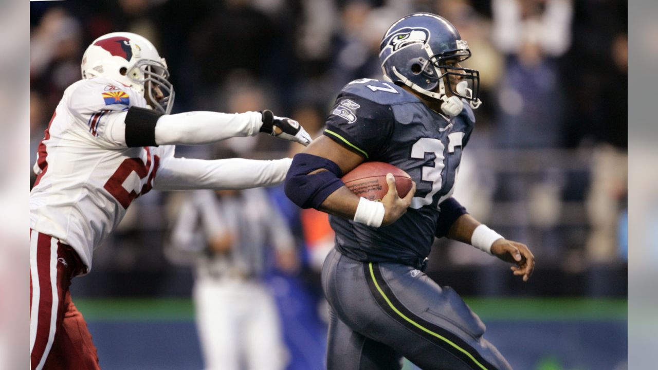 Seattle Seahawks cornerback Richard Sherman (25) and outside linebacker  K.J. Wright (50) team up to tackle Arizona Cardinals running back David  Johnson (31) at CenturyLink Field in Seattle, Washington on December 24