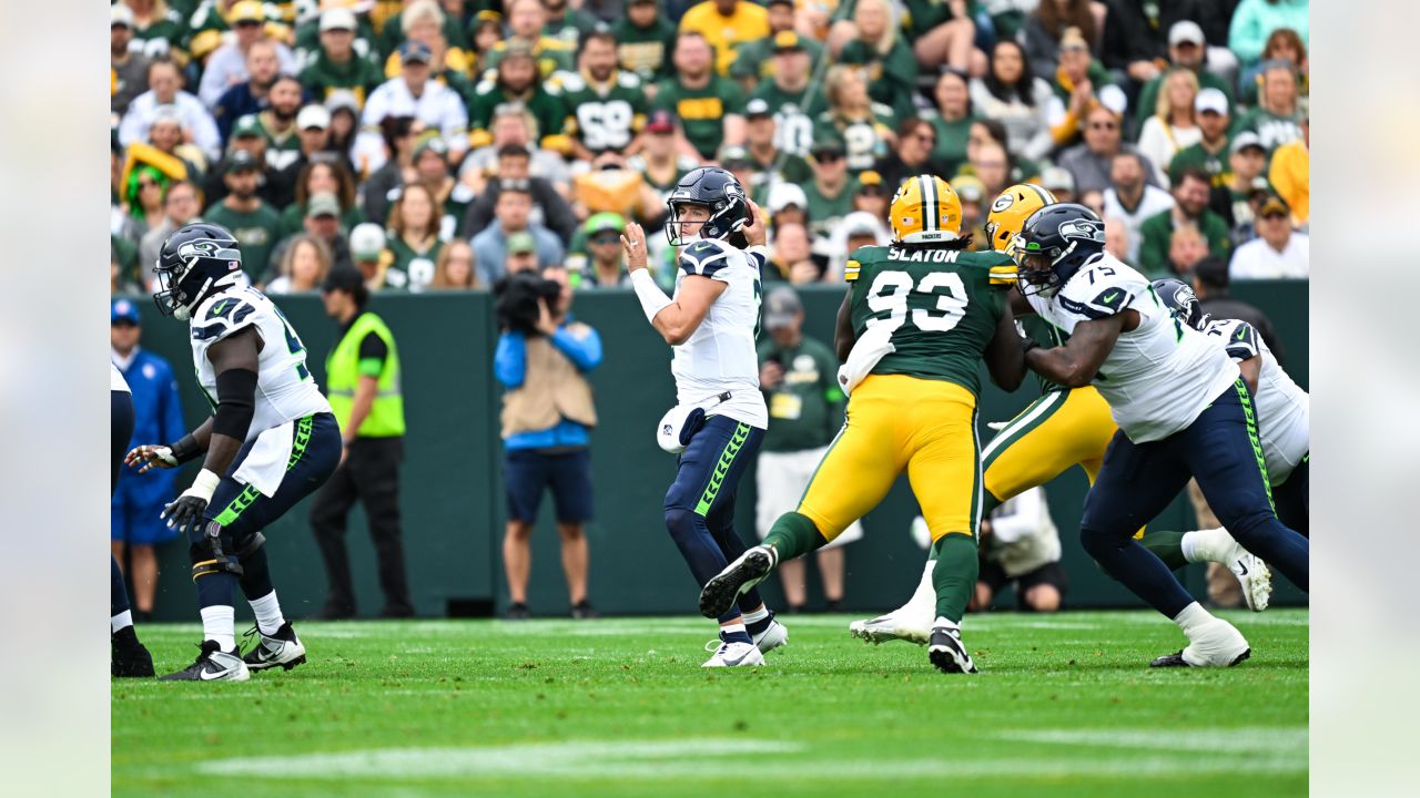 Seattle Seahawks defensive end Dre'Mont Jones (55) spikes the ball after a  teammate scored a touchdown during an NFL preseason game against the Green  Bay Packers Saturday, Aug. 26, 2023, in Green