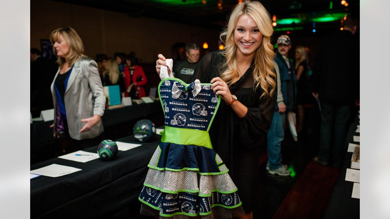 PHOTOS: Seahawks Dancers Sea Gals Holiday Auction Over the Years