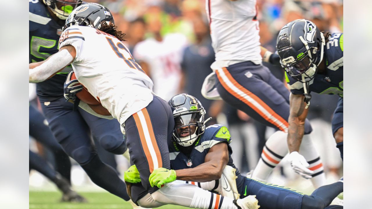 Seattle Seahawks quarterback Jacob Eason (17) scrambles before throwing a  pass in the second half of a preseason NFL football game against the Dallas  Cowboys in Arlington, Texas, Friday, Aug. 26, 2022. (