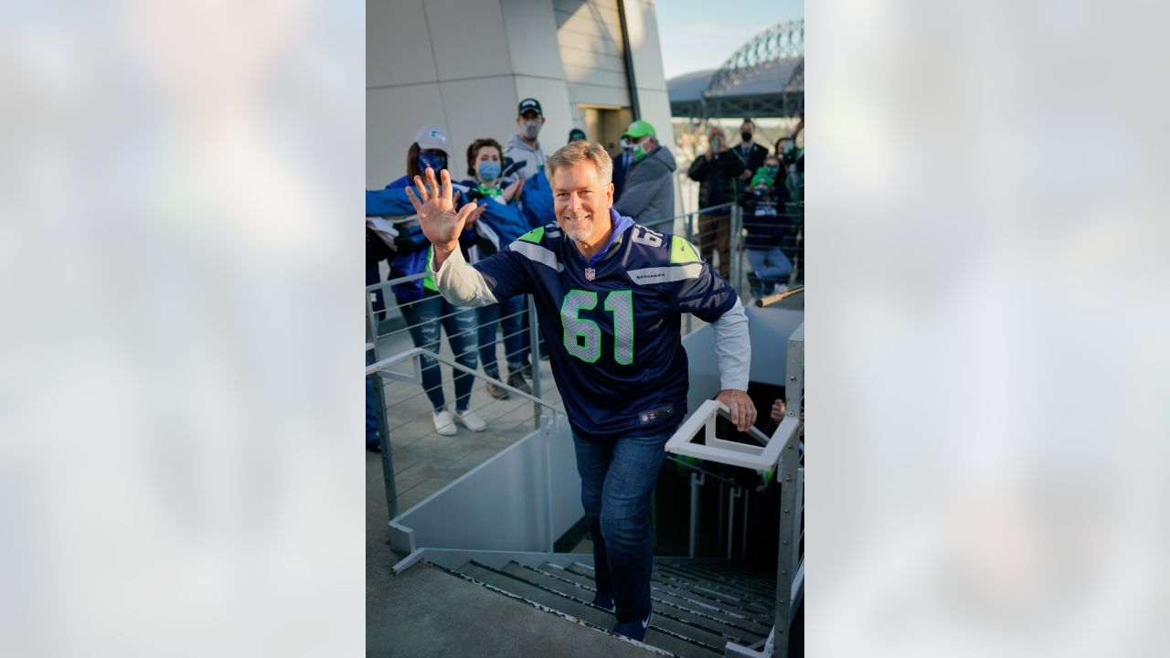 PHOTOS: Robbie Tobeck Raises 12 Flag Prior To Thursday Night