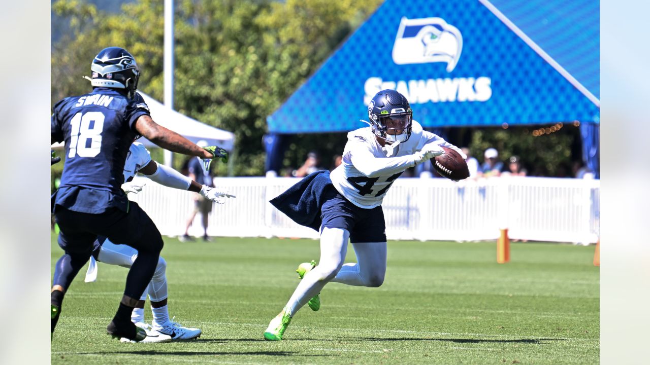 Seattle Seahawks - Lock taking time to meet with our military at practice  yesterday. Salute to service moment presented by USAA #SaluteToService