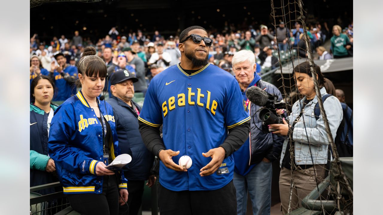 PHOTOS: Bobby Wagner Throws Out Ceremonial First Pitch At Mariners