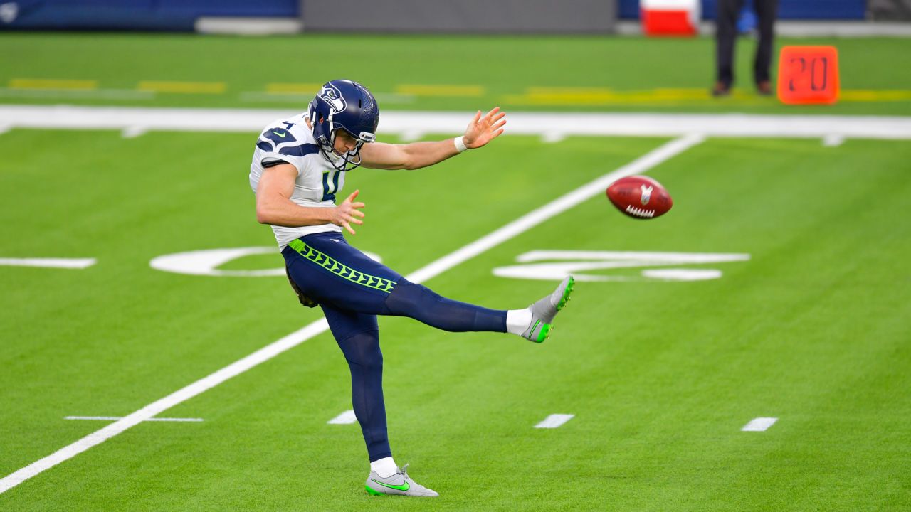 Punter (4) Michael Dickson of the Seattle Seahawks punts the ball against  the Houston Texans in an NFL football game, Sunday, Dec. 12, 2021, in  Houston, TX. Seahawks defeated the Texans 33-13. (