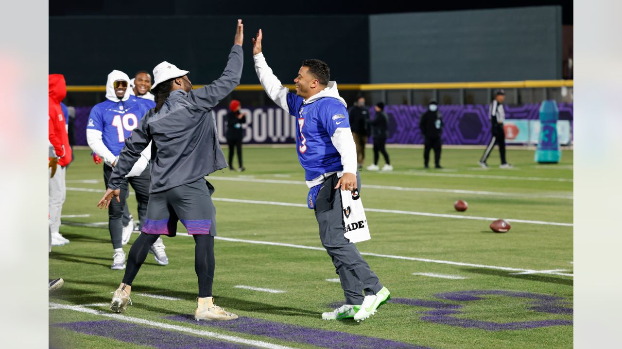 NFC cornerback Trevon Diggs of the Dallas Cowboys celebrates with Seattle  Seahawks Russell Wilson after competing in the Best Catch event at the 2022  Pro Bowl Skills Showdown Wednesday, February 2, 2022