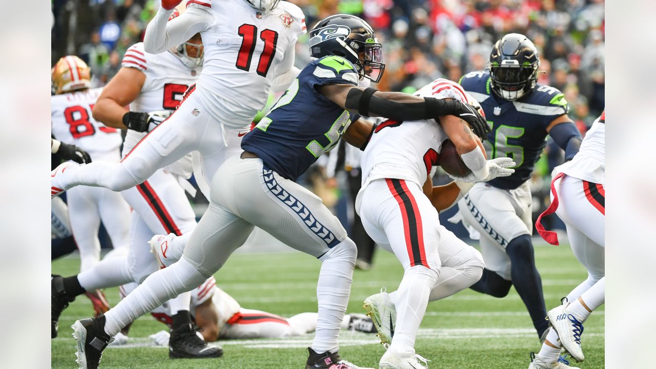 Seahawks hold on late for wild 30-23 win over 49ers