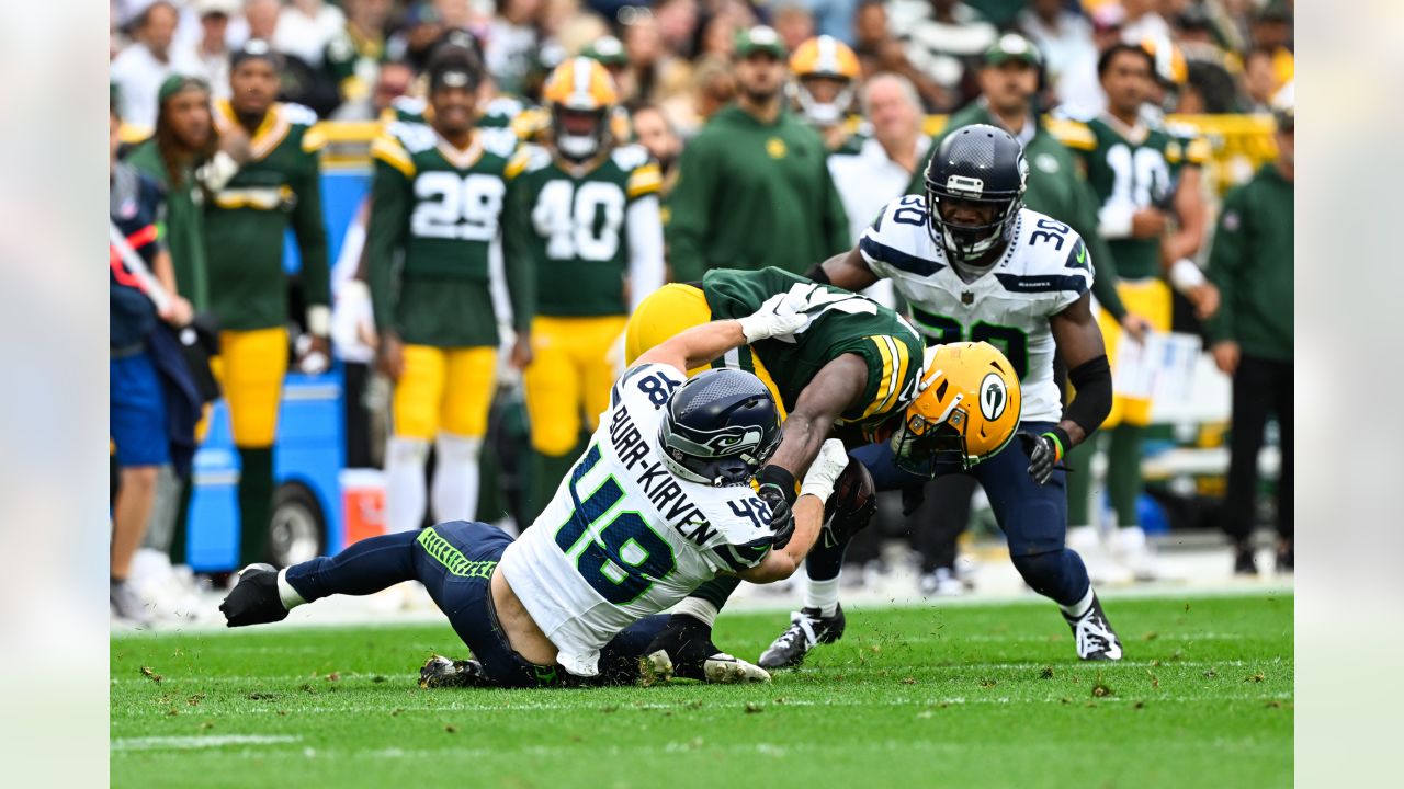 Seattle Seahawks defensive end Dre'Mont Jones (55) spikes the ball after a  teammate scored a touchdown during an NFL preseason game against the Green  Bay Packers Saturday, Aug. 26, 2023, in Green