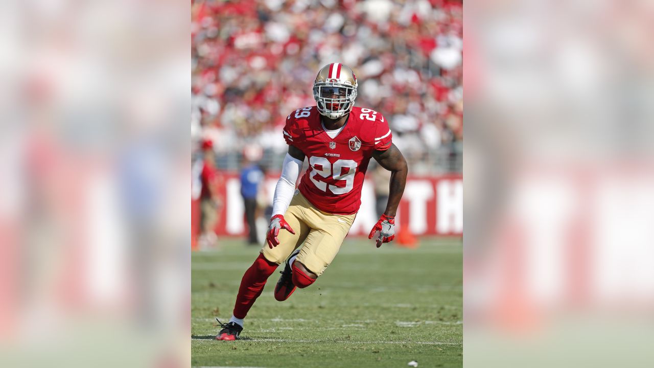 Green Bay Packers running back Aaron Jones (33) runs in front of San  Francisco 49ers cornerback Richard Sherman (25) and strong safety Jaquiski  Tartt (29) during the NFL football NFC Championship game