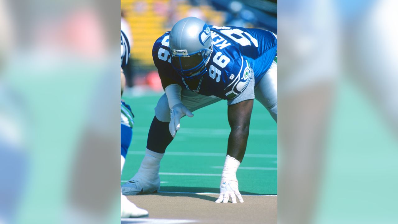 Seattle Seahawks' linebacker D.D. Lewis (54) hits Indianapolis Colts' wide  receiver Troy Rogers as he catches the ball during the second quarter of an NFL  football game Saturday, Dec. 24, 2005 in