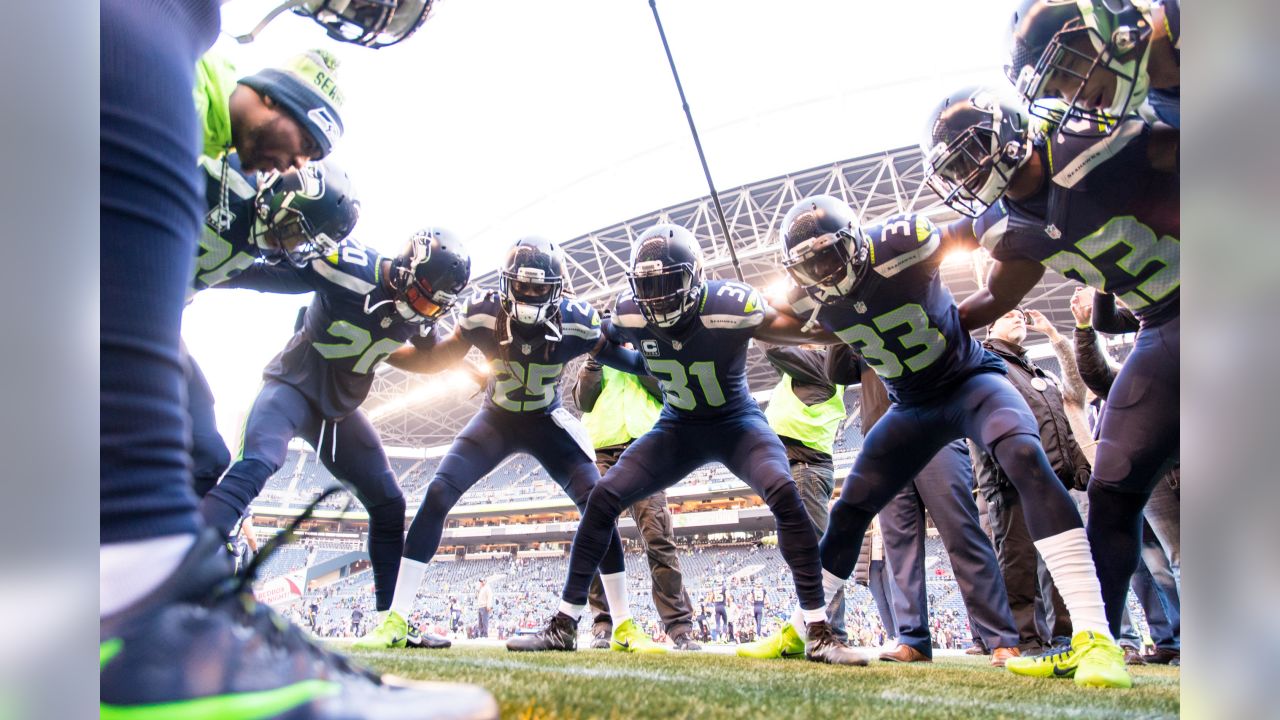 Charitybuzz: Ultimate Seattle Seahawks Package for 4: Pre-Game 12 Flag  Raising Experience, 4 Club Level Tickets and Post-Game Mid-Field Photo on  December 15 or 24 at CenturyLink Field