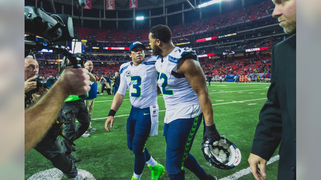 PHOTOS: Marshawn Lynch And Other Seahawks Legends Attend Seattle Kraken Game