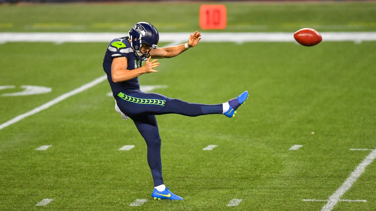 Seattle Seahawks punter Michael Dickson (4) punts during an NFL football  game against the Las Vegas