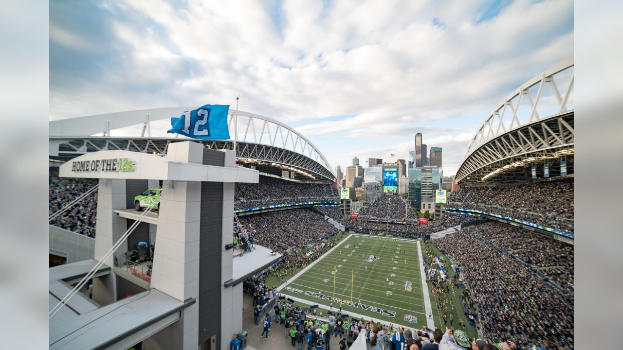 Charitybuzz: Ultimate Seattle Seahawks Package for 4: Pre-Game 12 Flag  Raising Experience, 4 Club Level Tickets and Post-Game Mid-Field Photo on  December 15 or 24 at CenturyLink Field