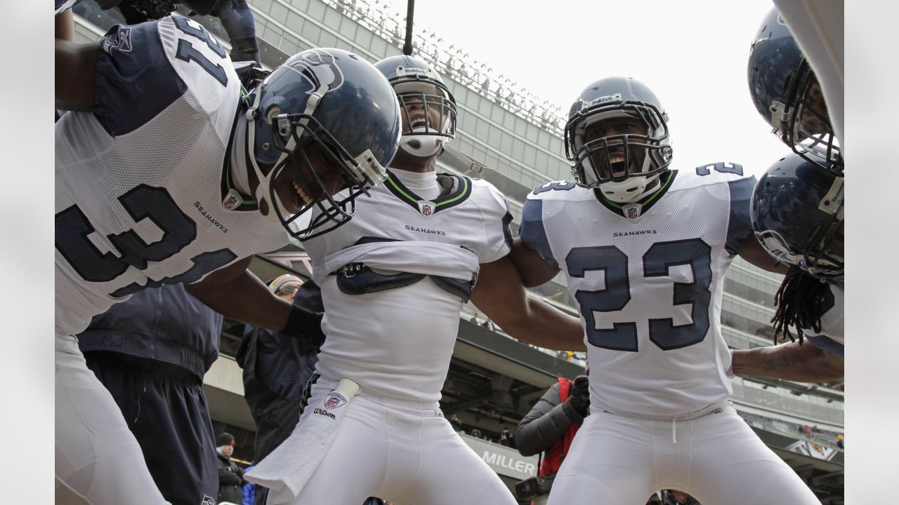 Former Seahawks player Marcus Trufant skydives into training camp