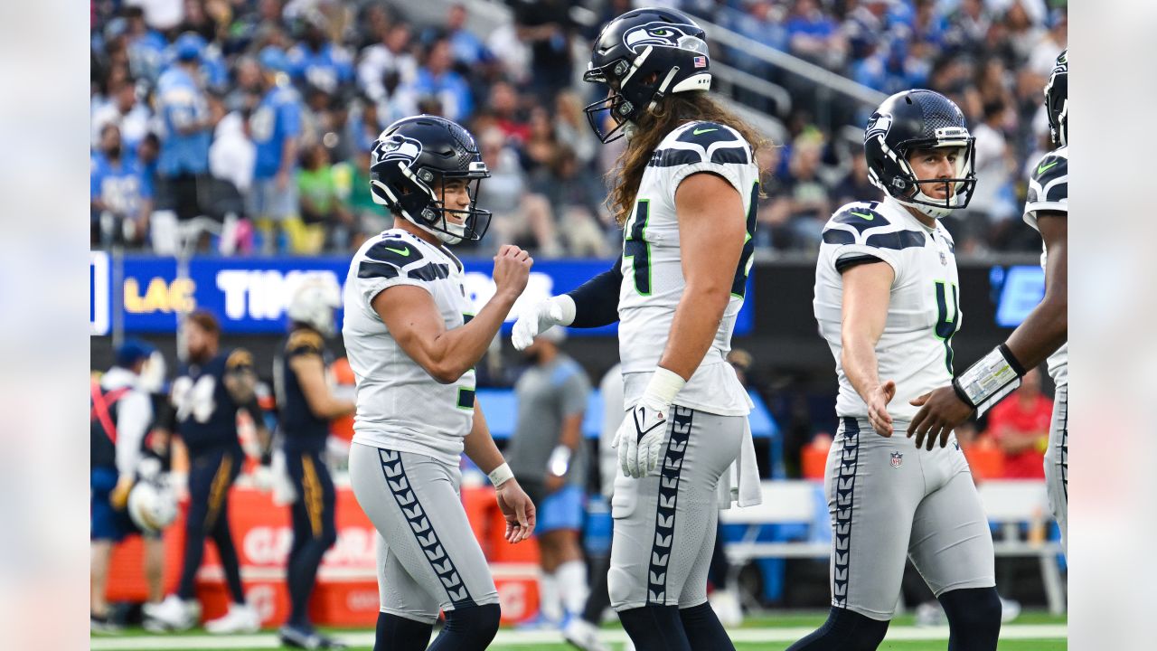 Seattle Seahawks wide receiver Tyjon Lindsey (81) holds a football while  running a receiving drill during the NFL football team's training camp,  Wednesday, July 26, 2023, in Renton, Wash. (AP Photo/Lindsey Wasson