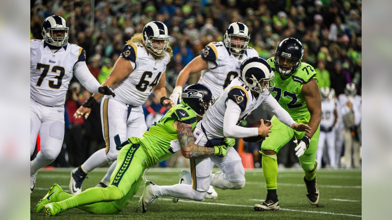 This Sept. 18, 2016 photo Los Angeles Rams' running back Todd Gurley, right  exchanges jersey's with Seattle Seahawks Tyler Lockett after an NFL  football game between the Los Angeles Rams and the