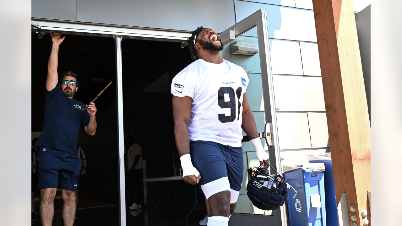 Seattle Seahawks - Lock taking time to meet with our military at practice  yesterday. Salute to service moment presented by USAA #SaluteToService