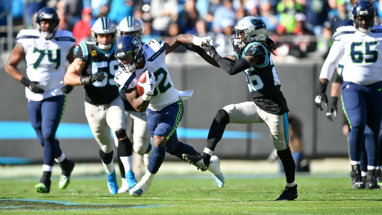 Carolina Panthers cornerback Donte Jackson breaks up a pass intended for  Seattle Seahawks wide receiver Tyler Lockett during the first half of an  NFL football game Sunday, Sept. 24, 2023, in Seattle. (