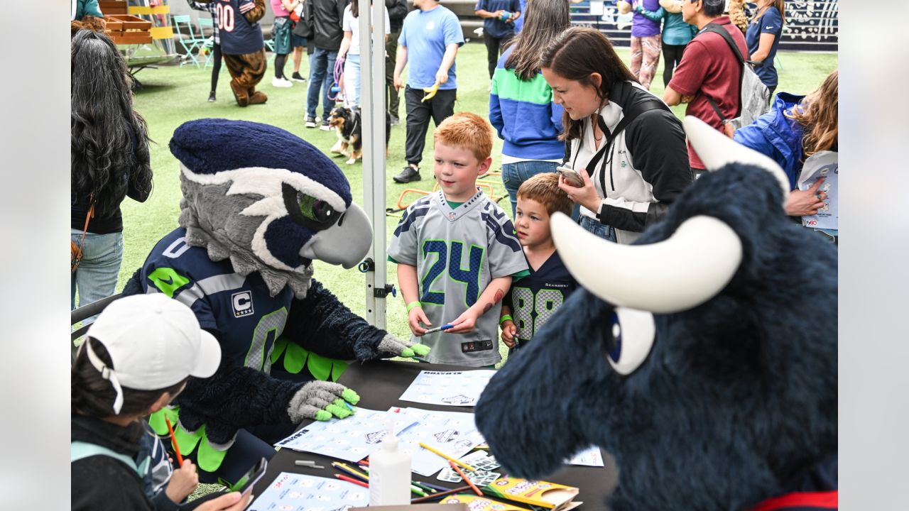 Metropolitan Police officers pose for photos with NFL Mascots during the  Fan event on the Southbank of the River Thames with activities and an NFL  shop on Saturday, Oct. 01 2022 in