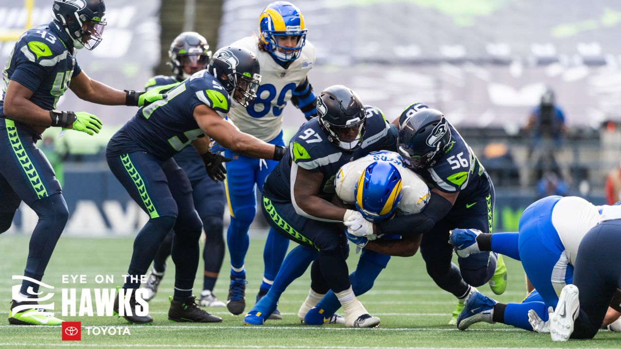 Seattle Seahawks defensive tackle Myles Adams (95) walks off the