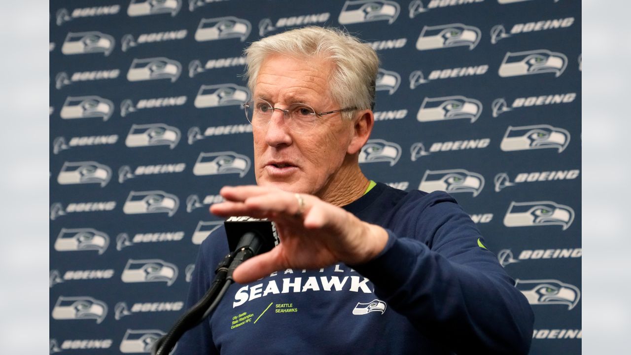 Seattle Seahawks guard Damien Lewis, left, celebrates with head coach Pete  Carroll after the team scored during the first half of an NFL football game  against the Arizona Cardinals in Glendale, Ariz.