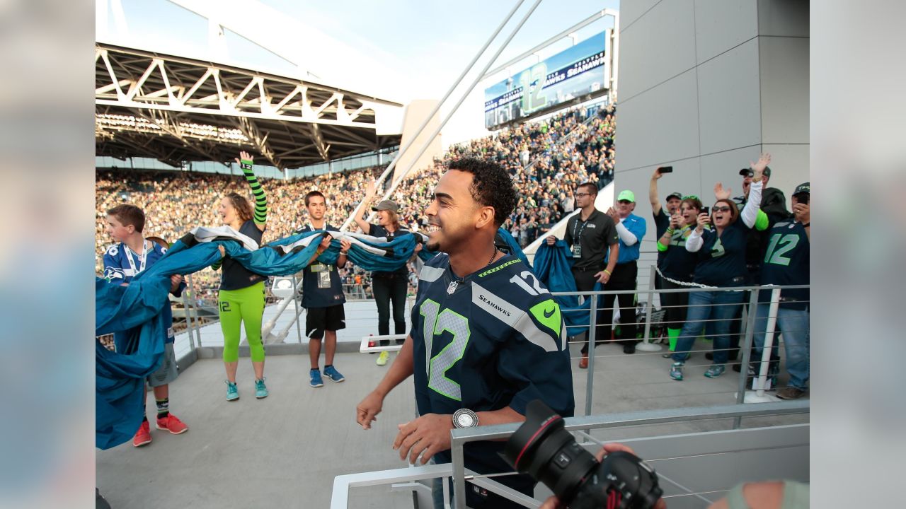 Nelson Cruz Raises 12th Man Flag at Seahawks Game, by Mariners PR