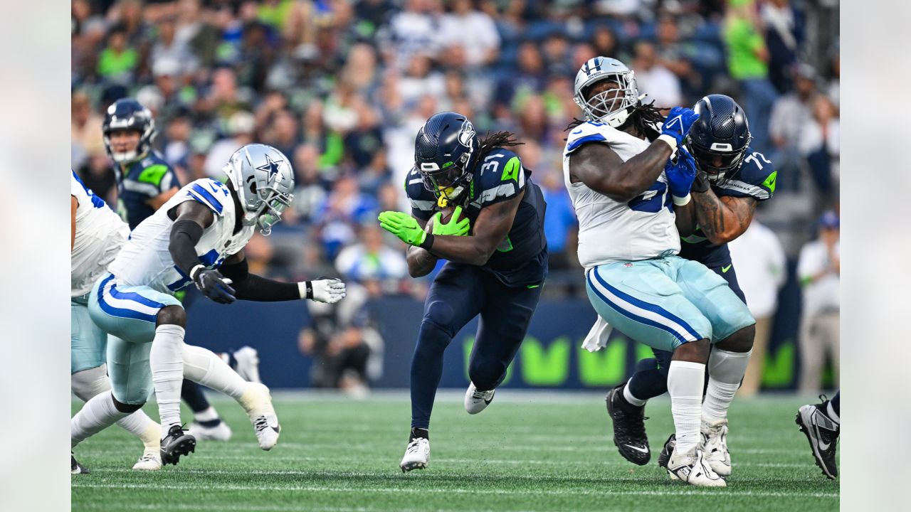 Seattle Seahawks quarterback Holton Ahlers looks to pass against the Dallas  Cowboys during the first half of a preseason NFL football game Saturday,  Aug. 19, 2023, in Seattle. (AP Photo/Stephen Brashear Stock