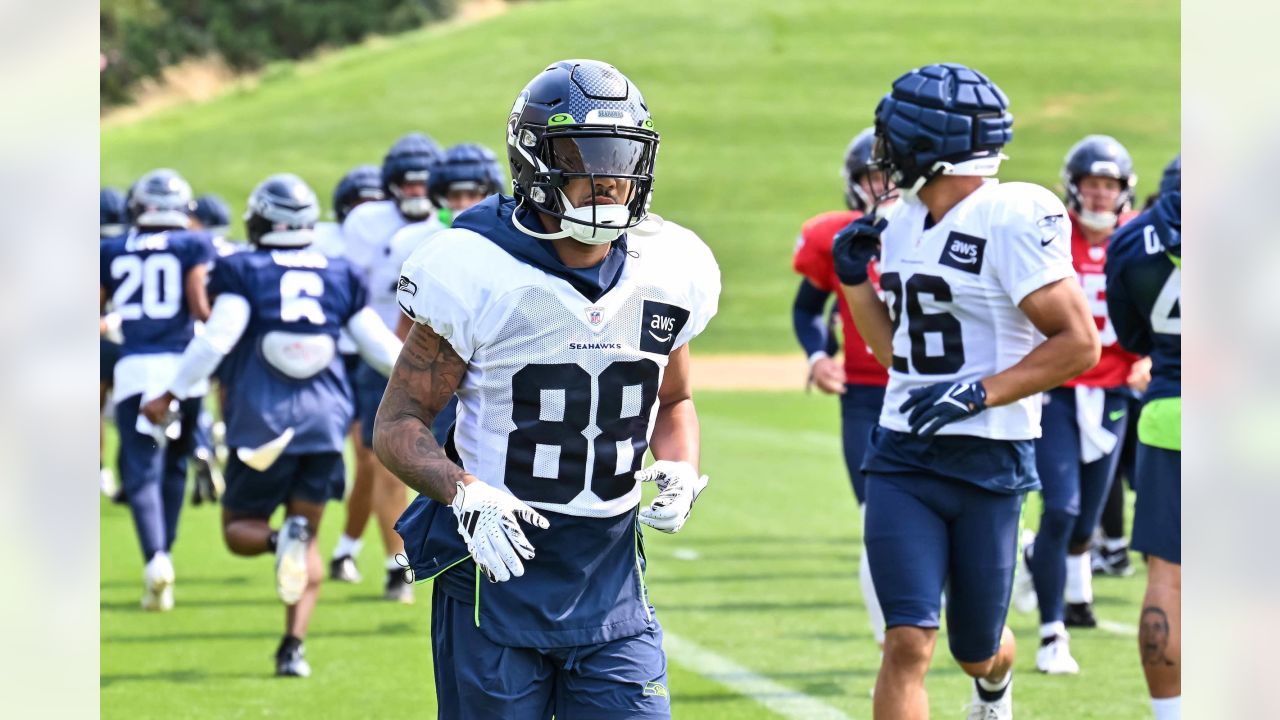 Seattle Seahawks wide receiver Jake Bobo (19) runs with the ball and scores  a touchdown during an NFL pre-season football game against the Minnesota  Vikings, Thursday, Aug. 10, 2023 in Seattle. (AP